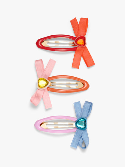 Stych Girl's Pack of three colouful hair clips with decorative bows and heart gems