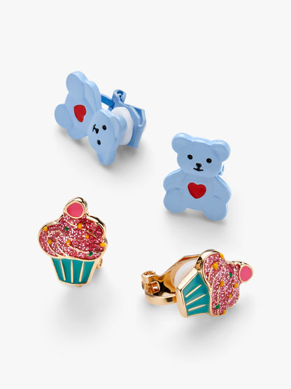Stych Girls Set of two colourful clip-on earrings in two styles, a blue teddy bear and red heart middle and pink glitter enamel cupcakes, both with gold tone clip-on backs. 