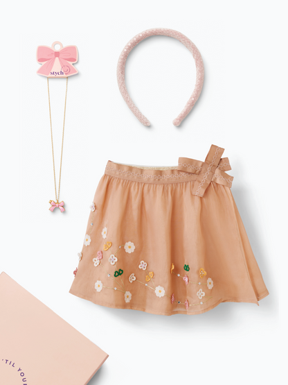 Stych Girls Pink Occasion Gift Box that includes, Tulle Floral Embroidered Taffeta Wrap Skirt, Pink Bow Locket Necklace, Sequin Pink Sparkle Headband. Wrapped and gifted in a reuseable sliding Box 