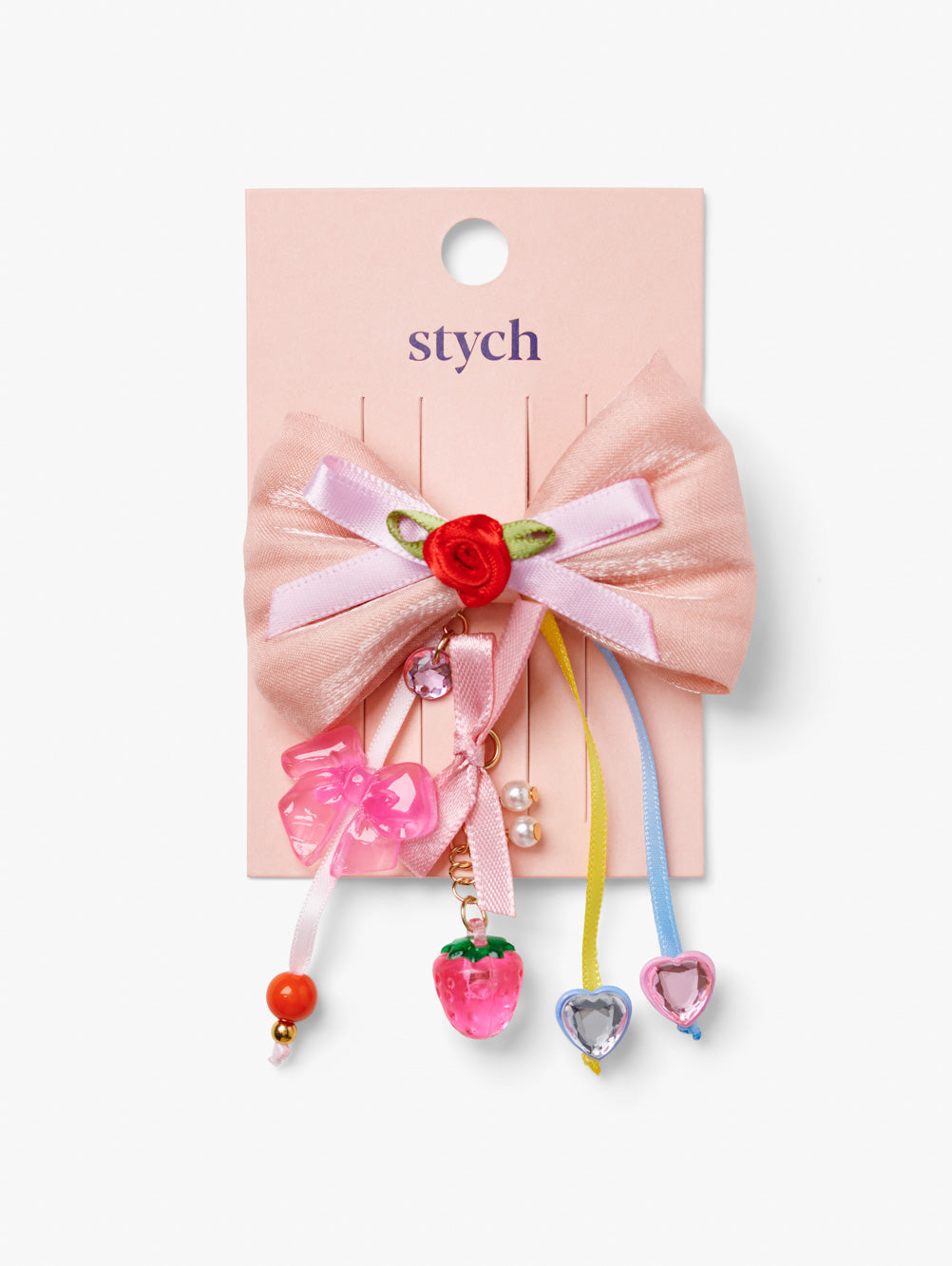 Girls Pink taffeta bow hair clip with rose detail and hanging charms of bows, heart gems and strawberries