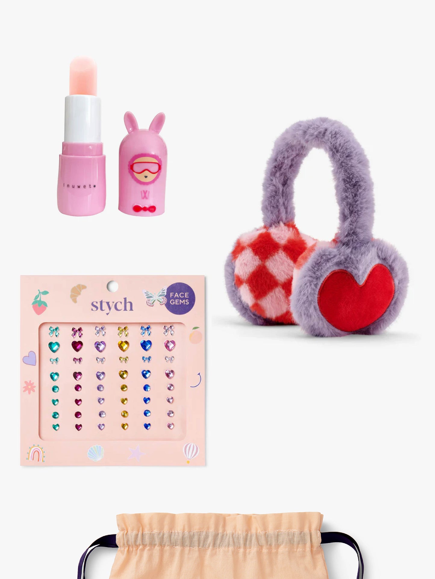 Stych Kids ski collection gift set, including a lip balm, face gems and lilac faux fur earmuffs, gifted in a gift set 