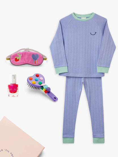 Stych Kids Sleepover Pamper blue pyjama set with pink velour eye mask, pink nail polish, and brush with hairbands gifted in a box