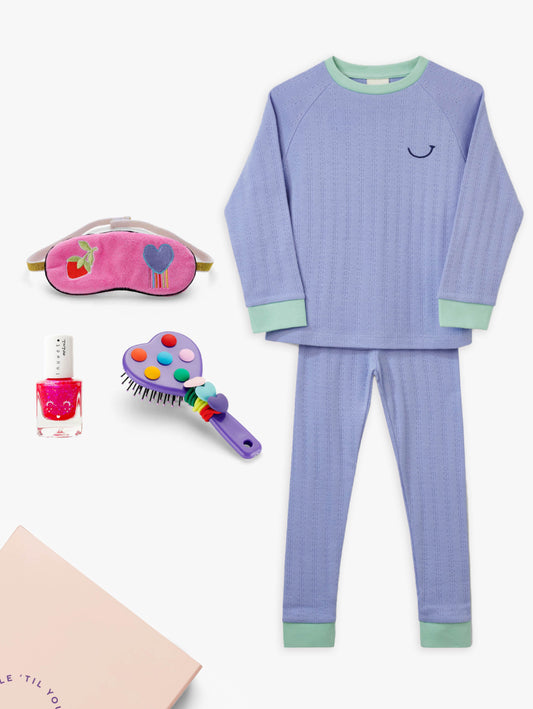 Stych Kids Sleepover Pamper blue pyjama set with pink velour eye mask, pink nail polish, and brush with hairbands gifted in a box