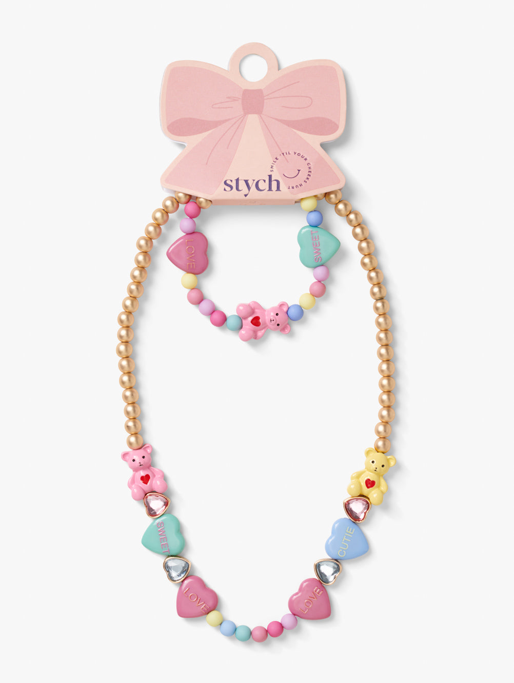 Stych Girls's matching necklace and bracelet set, with pastel colour teddy bear and heart shapes, heart gems and colour beads, set on a gold tone beaded chain. Elasticated.