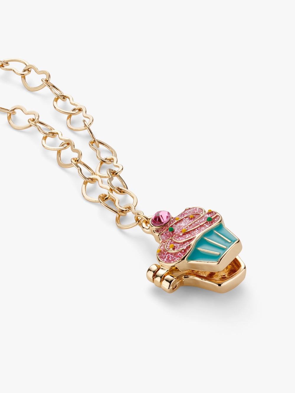 Stych Girls gold tone heart chain necklace with a pink and blue sparkly decorative cupcake enamel locket pendant. Locket opens. Adjustable chain. 