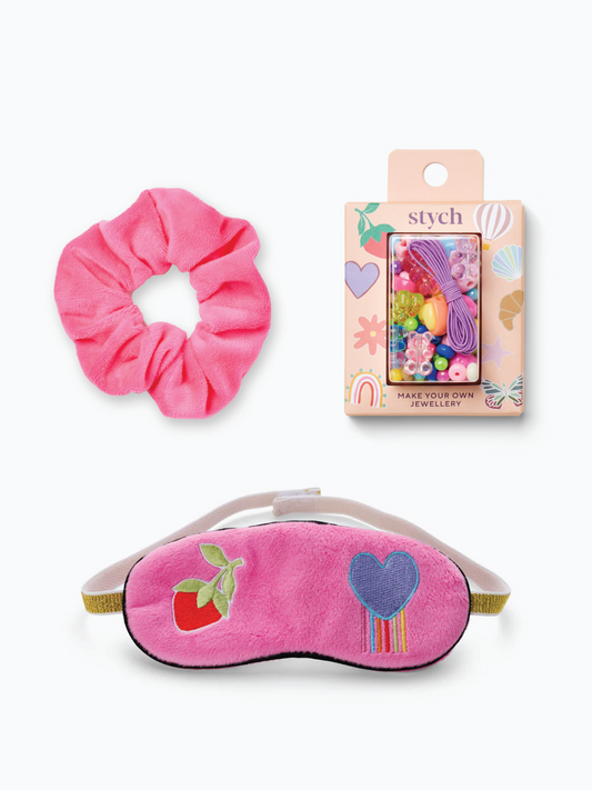 Stych Girls Pink themed Sleepover Party Bag Gift, includes Pink scrunchie, soft velour pink sleep mask with heart design, and Make Your Own jewellery kit. 