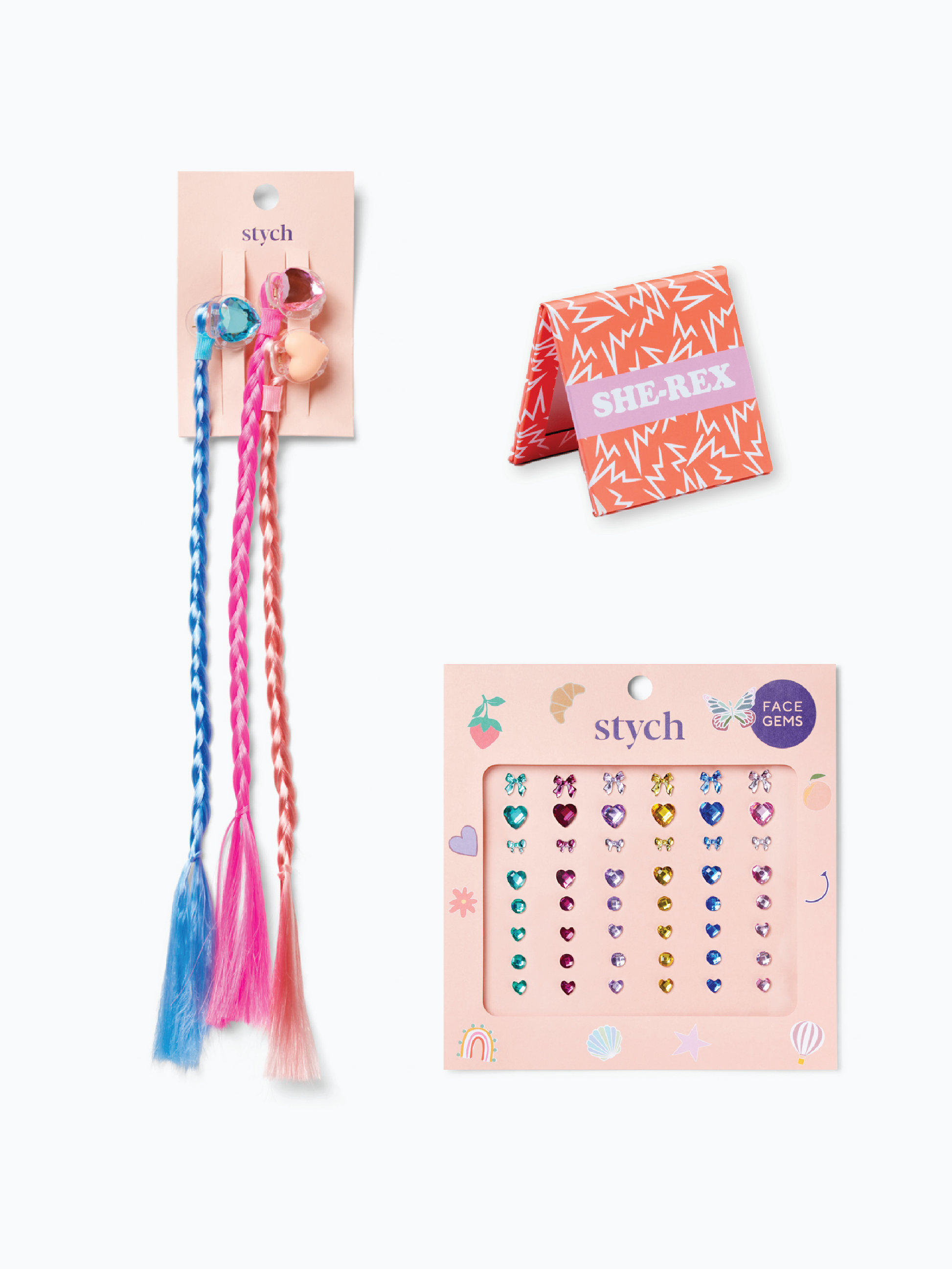 Stych Girls Glamour Party Bag Gift Set including Pack of 3 Plait Faux Hair Heart Clips, Rainbow colour Face Gem Pack, Pocket fold-over mirror with slogan She-Rex. 