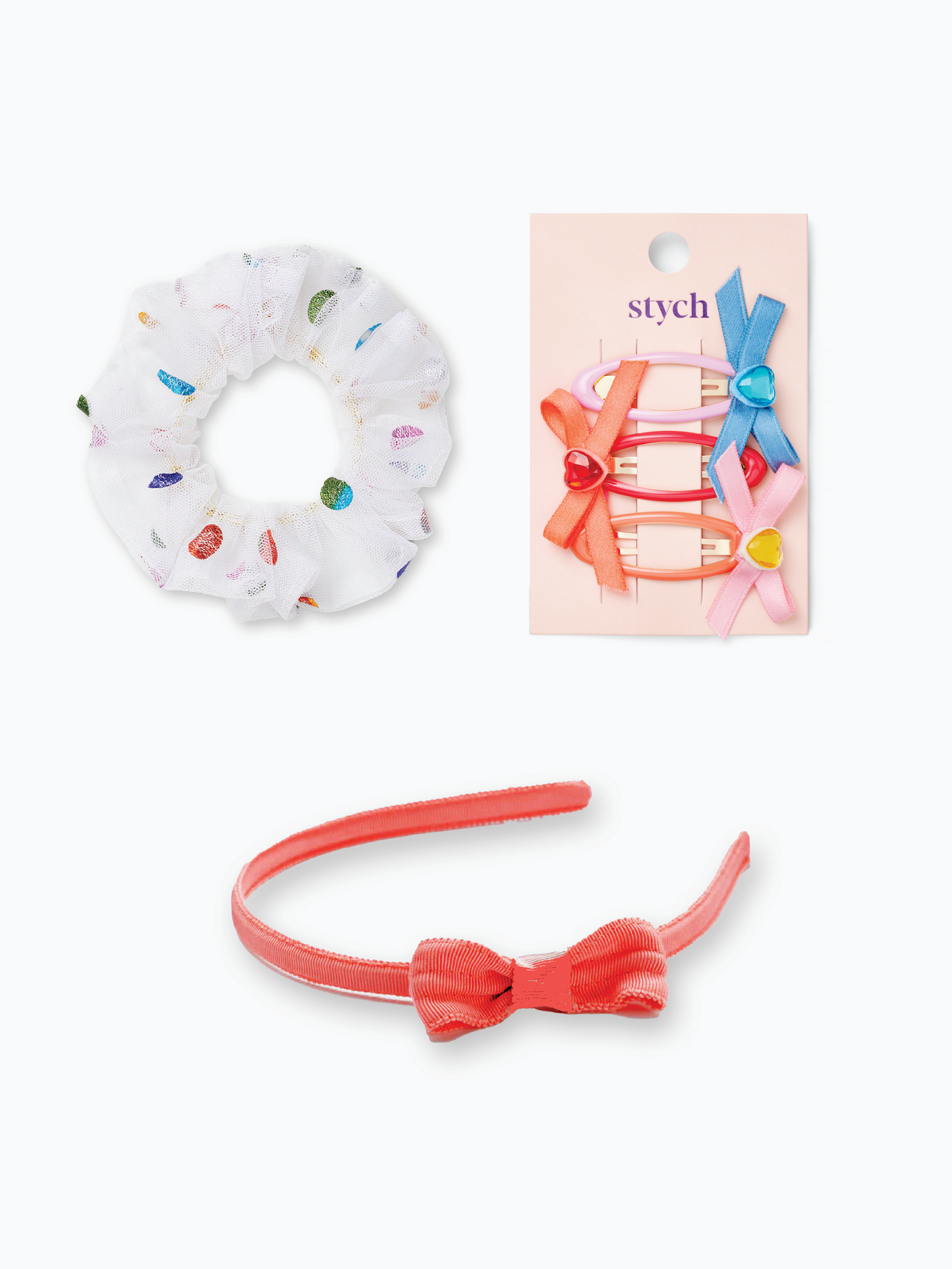 Stych Girls Bow themed party bag gift, including 3 Pack Bow & Gem Colourful Hair clips, Grosgrain ribbed bow Headband, Rainbow spot on white tulle scrunchie.