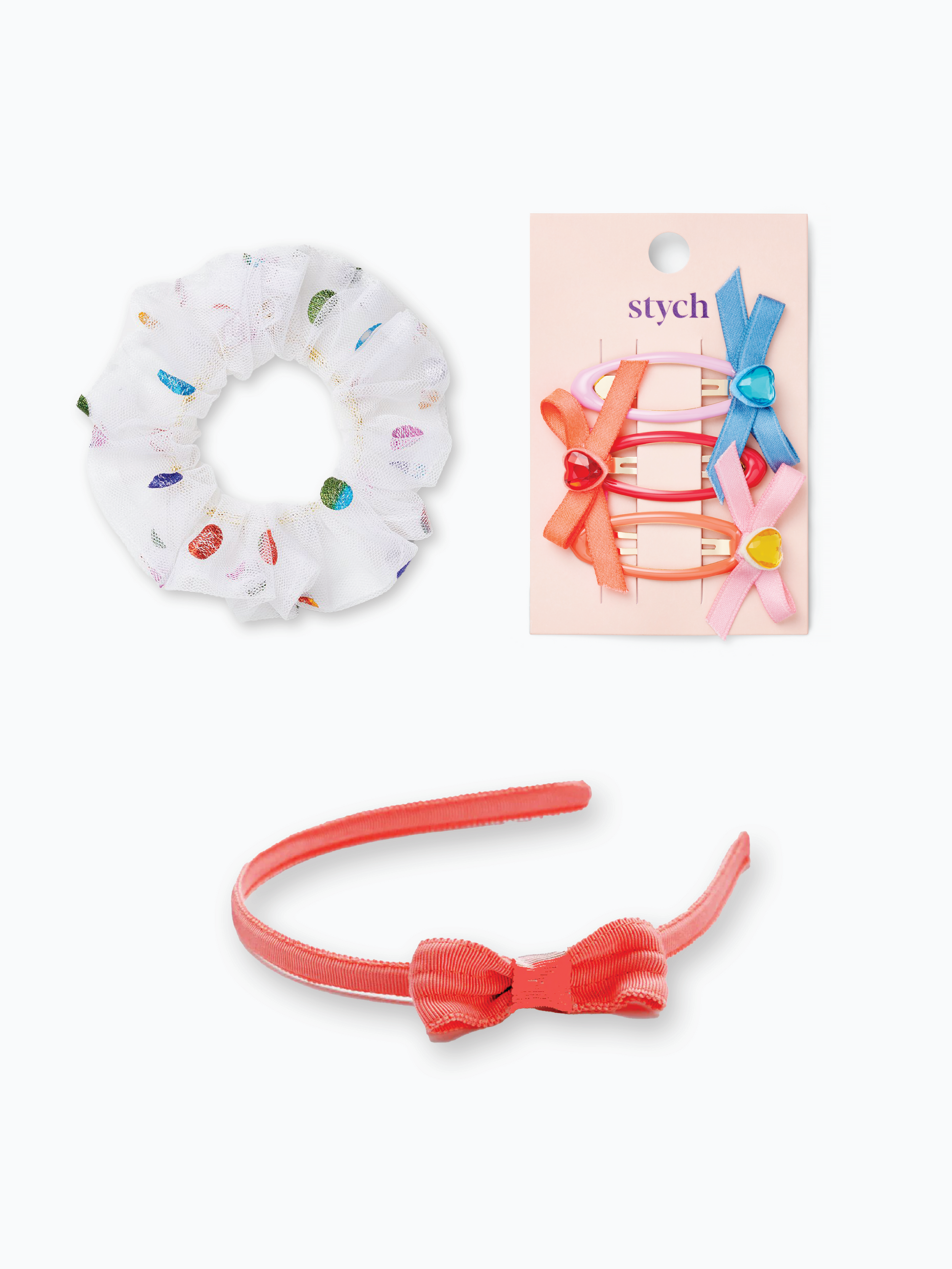 Stych Girls Bow themed party bag gift, including 3 Pack Bow & Gem Colourful Hair clips, Grosgrain ribbed bow Headband, Rainbow spot on white tulle scrunchie.