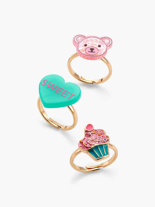 Stych Girls Set of 3 decorative rings with a teddy bear face, glitter cupcake and slogan heart, on adjustable bands. 