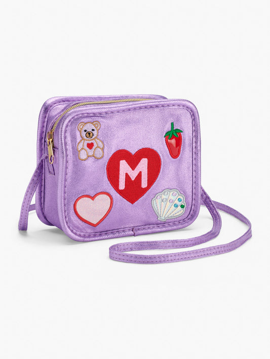Stych Girls Purple shimmering fabric square crossbody bag with embroidered initial heart, teddy bear, strawberry, herat and gem shell detailing. Zip closure, crossbody strap. 